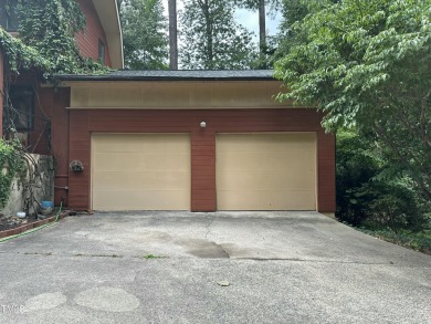 Discover this architecturally stunning 3-bedroom, 2.5-bath on Governors Club in North Carolina - for sale on GolfHomes.com, golf home, golf lot