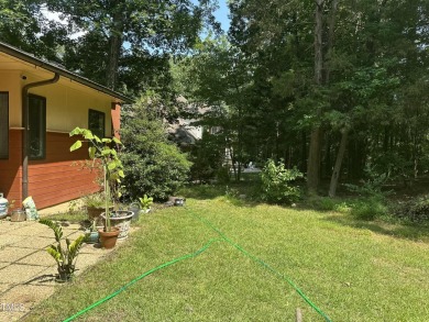 Discover this architecturally stunning 3-bedroom, 2.5-bath on Governors Club in North Carolina - for sale on GolfHomes.com, golf home, golf lot