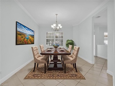 Located in the Cotton Green neighborhood of Fiddler's Creek on The Rookery At Marco in Florida - for sale on GolfHomes.com, golf home, golf lot