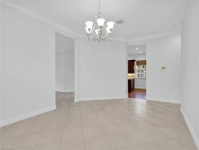 Located in the Cotton Green neighborhood of Fiddler's Creek on The Rookery At Marco in Florida - for sale on GolfHomes.com, golf home, golf lot