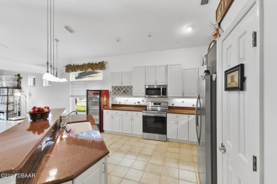 Beautifully built model home.   This 3-bedroom 2 bath over 2500 on Halifax Plantation Golf Club in Florida - for sale on GolfHomes.com, golf home, golf lot