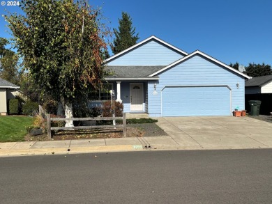 This home is nestled in a quiet, endearing neighborhood and on Emerald Valley Golf Course in Oregon - for sale on GolfHomes.com, golf home, golf lot