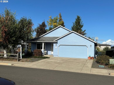 This home is nestled in a quiet, endearing neighborhood and on Emerald Valley Golf Course in Oregon - for sale on GolfHomes.com, golf home, golf lot