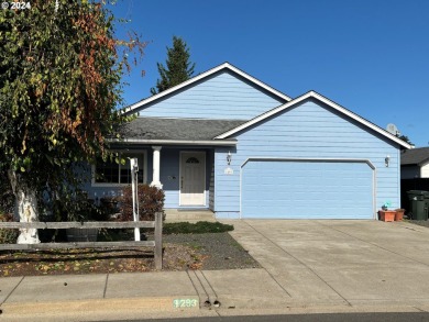 This home is nestled in a quiet, endearing neighborhood and on Emerald Valley Golf Course in Oregon - for sale on GolfHomes.com, golf home, golf lot