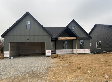 4 Bedrooms, 3 FULL Baths with a finished, rear WALKOUT lower on Covered Bridge Golf Club in Indiana - for sale on GolfHomes.com, golf home, golf lot