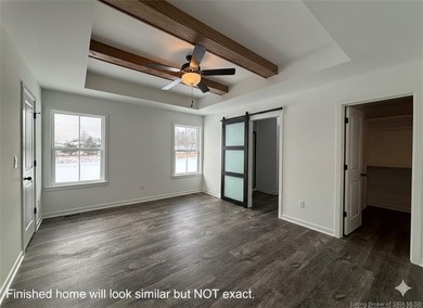 4 Bedrooms, 3 FULL Baths with a finished, rear WALKOUT lower on Covered Bridge Golf Club in Indiana - for sale on GolfHomes.com, golf home, golf lot