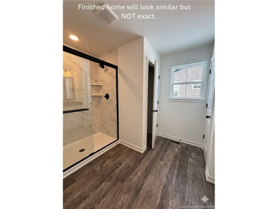 4 Bedrooms, 3 FULL Baths with a finished, rear WALKOUT lower on Covered Bridge Golf Club in Indiana - for sale on GolfHomes.com, golf home, golf lot