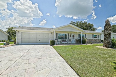 This beautifully updated expanded pecan model in Spruce Creek on The Links of Spruce Creek in Florida - for sale on GolfHomes.com, golf home, golf lot