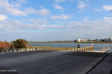 If you've been watching for the perfect coastal home, this on Brick Landing Plantation Yacht and Golf Club in North Carolina - for sale on GolfHomes.com, golf home, golf lot