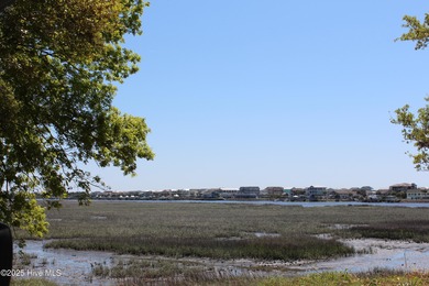 If you've been watching for the perfect coastal home, this on Brick Landing Plantation Yacht and Golf Club in North Carolina - for sale on GolfHomes.com, golf home, golf lot