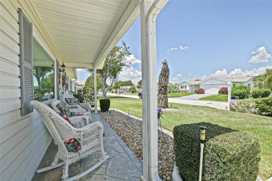 This beautifully updated expanded pecan model in Spruce Creek on The Links of Spruce Creek in Florida - for sale on GolfHomes.com, golf home, golf lot