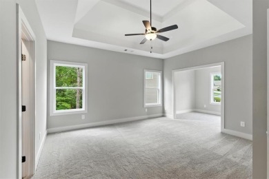 Welcome Home to 29 Creekview Drive! This stunning Alexander on The Plantation Golf Club in Georgia - for sale on GolfHomes.com, golf home, golf lot