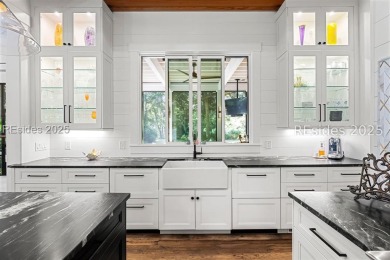 Where contemporary elegance meets timeless Lowcountry beauty on Old Tabby Links on Spring Island in South Carolina - for sale on GolfHomes.com, golf home, golf lot