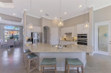 Welcome to 25261 Spartina Drive, the epitome of elegance in the on Sarasota National Golf Club in Florida - for sale on GolfHomes.com, golf home, golf lot