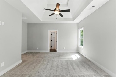 Welcome Home to 29 Creekview Drive! This stunning Alexander on The Plantation Golf Club in Georgia - for sale on GolfHomes.com, golf home, golf lot