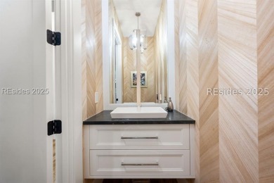 Where contemporary elegance meets timeless Lowcountry beauty on Old Tabby Links on Spring Island in South Carolina - for sale on GolfHomes.com, golf home, golf lot