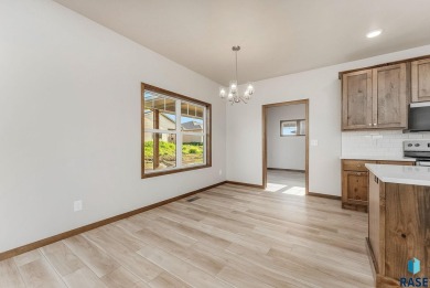 Beautiful Independence Villa Plan with 3 Car Garage and Covered on Brandon Municipal Golf Course in South Dakota - for sale on GolfHomes.com, golf home, golf lot