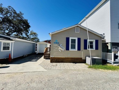 WELL MAINTAINED 2 BED/2 BATH BEACH HOUSE JUST STEPS TO THE BEACH on Prestwick Country Club in South Carolina - for sale on GolfHomes.com, golf home, golf lot