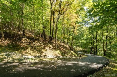 Nestled within the confines of the Bald Rock community, this on Sapphire National Golf Club in North Carolina - for sale on GolfHomes.com, golf home, golf lot