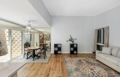 Welcome to this beautifully transformed and private end-unit on Laguna Woods Village Golf Course in California - for sale on GolfHomes.com, golf home, golf lot