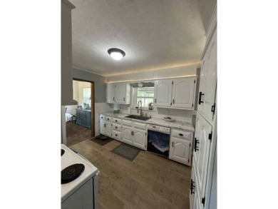 Welcome to this stunning 3-bedroom, 2-bathroom home located just on Sunset Hills Golf Course in Oklahoma - for sale on GolfHomes.com, golf home, golf lot