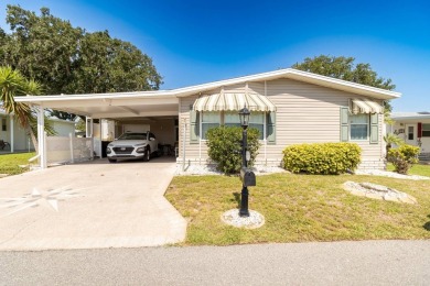 Discover a residence nestled within Winter Haven's prestigious on Four Lakes Golf Club in Florida - for sale on GolfHomes.com, golf home, golf lot