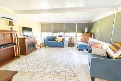 Discover a residence nestled within Winter Haven's prestigious on Four Lakes Golf Club in Florida - for sale on GolfHomes.com, golf home, golf lot