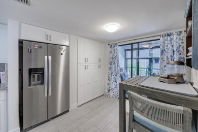 Completely remodeled ground floor end unit 2/2 with den and one on Kelly Greens Golf and Country Club in Florida - for sale on GolfHomes.com, golf home, golf lot