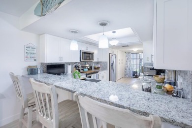 Completely remodeled ground floor end unit 2/2 with den and one on Kelly Greens Golf and Country Club in Florida - for sale on GolfHomes.com, golf home, golf lot