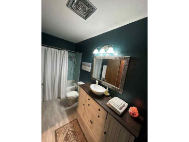 Welcome to this stunning 3-bedroom, 2-bathroom home located just on Sunset Hills Golf Course in Oklahoma - for sale on GolfHomes.com, golf home, golf lot