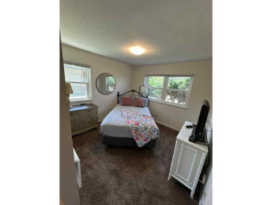Welcome to this stunning 3-bedroom, 2-bathroom home located just on Sunset Hills Golf Course in Oklahoma - for sale on GolfHomes.com, golf home, golf lot