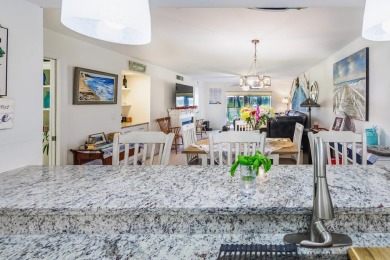 Completely remodeled ground floor end unit 2/2 with den and one on Kelly Greens Golf and Country Club in Florida - for sale on GolfHomes.com, golf home, golf lot