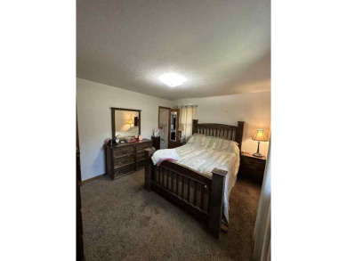 Welcome to this stunning 3-bedroom, 2-bathroom home located just on Sunset Hills Golf Course in Oklahoma - for sale on GolfHomes.com, golf home, golf lot
