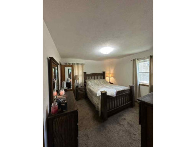 Welcome to this stunning 3-bedroom, 2-bathroom home located just on Sunset Hills Golf Course in Oklahoma - for sale on GolfHomes.com, golf home, golf lot