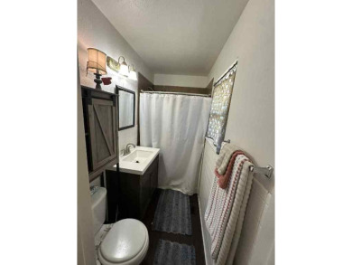 Welcome to this stunning 3-bedroom, 2-bathroom home located just on Sunset Hills Golf Course in Oklahoma - for sale on GolfHomes.com, golf home, golf lot