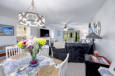 Completely remodeled ground floor end unit 2/2 with den and one on Kelly Greens Golf and Country Club in Florida - for sale on GolfHomes.com, golf home, golf lot