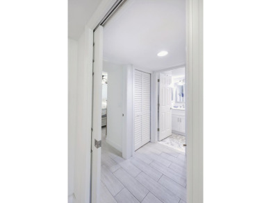 Completely remodeled ground floor end unit 2/2 with den and one on Kelly Greens Golf and Country Club in Florida - for sale on GolfHomes.com, golf home, golf lot