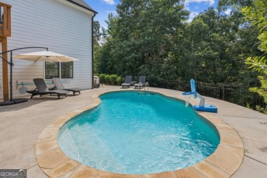 Amazing new listing nestled on a quiet cul-de-sac in one of the on Reunion Golf Club in Georgia - for sale on GolfHomes.com, golf home, golf lot