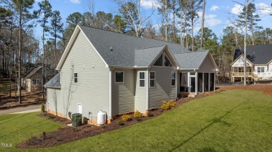 Step into timeless elegance with this gorgeous one and a half on River Golf and County Club at Lake Royale in North Carolina - for sale on GolfHomes.com, golf home, golf lot