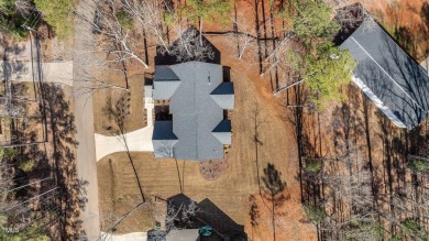 Step into timeless elegance with this gorgeous one and a half on River Golf and County Club at Lake Royale in North Carolina - for sale on GolfHomes.com, golf home, golf lot