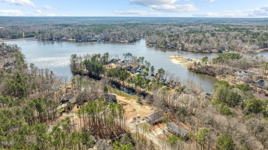 Step into timeless elegance with this gorgeous one and a half on River Golf and County Club at Lake Royale in North Carolina - for sale on GolfHomes.com, golf home, golf lot