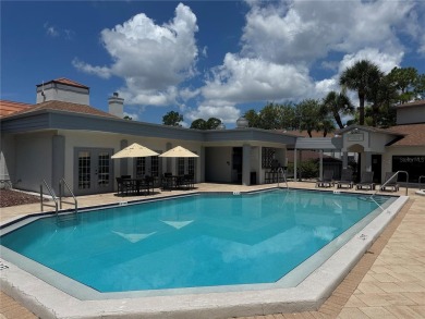 Enjoy all the benefits of Florida living, without the hassle of on Feather Sound Country Club in Florida - for sale on GolfHomes.com, golf home, golf lot