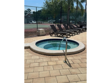 Enjoy all the benefits of Florida living, without the hassle of on Feather Sound Country Club in Florida - for sale on GolfHomes.com, golf home, golf lot