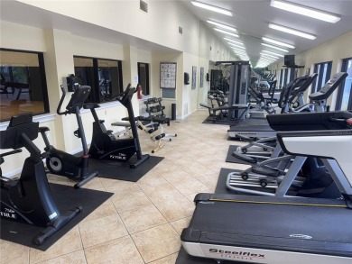 Enjoy all the benefits of Florida living, without the hassle of on Feather Sound Country Club in Florida - for sale on GolfHomes.com, golf home, golf lot