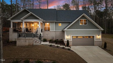 Step into timeless elegance with this gorgeous Craftsman Ranch on River Golf and County Club at Lake Royale in North Carolina - for sale on GolfHomes.com, golf home, golf lot