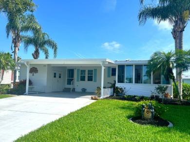 Step into luxury with this stunning 2-bedroom, 2-bathroom Pebble on Crane Lakes Golf and Country Club in Florida - for sale on GolfHomes.com, golf home, golf lot