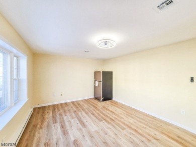 Beautifully renovated 2-bedroom, 1.5-bath ranch with carport on Rossmoor Golf Club in New Jersey - for sale on GolfHomes.com, golf home, golf lot