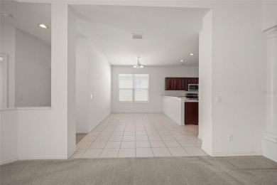SAY HELLO TO A GOOD BUY * NEW ROOF DECEMBER 2020 * Enjoy the on Tatum Ridge Golf Links in Florida - for sale on GolfHomes.com, golf home, golf lot