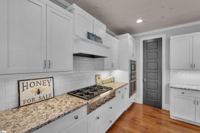 Set on a private 1.12-acre cul-de-sac lot, this expanded and on The Reserve At Lake Keowee in South Carolina - for sale on GolfHomes.com, golf home, golf lot
