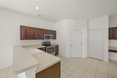 SAY HELLO TO A GOOD BUY * NEW ROOF DECEMBER 2020 * Enjoy the on Tatum Ridge Golf Links in Florida - for sale on GolfHomes.com, golf home, golf lot